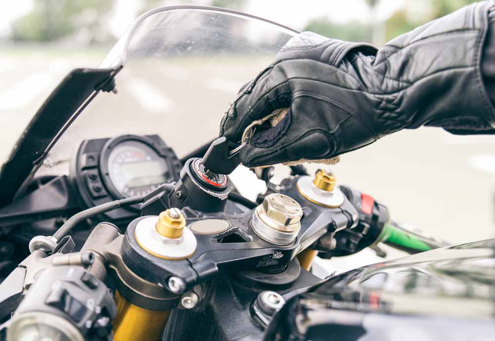 Motorcycle Ignition Action Inserting The Key And Starting The Engine — All Pro Locksmiths in Port Macquarie, NSW