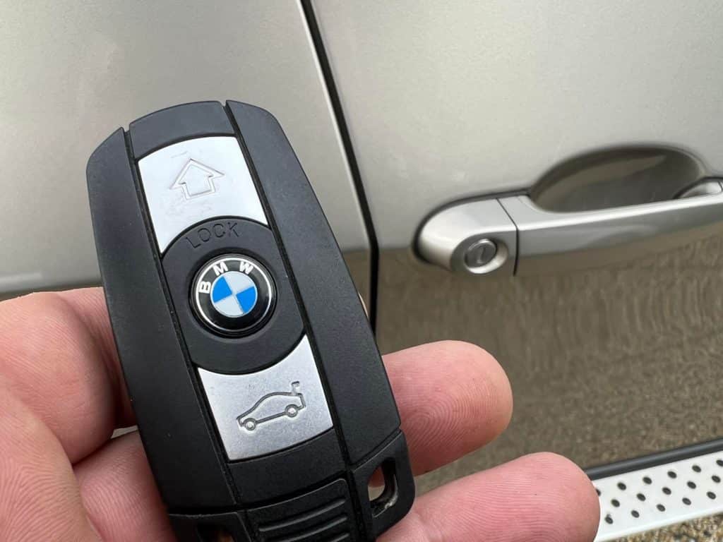 A BMW car transponder in a mans hand in port macquarie